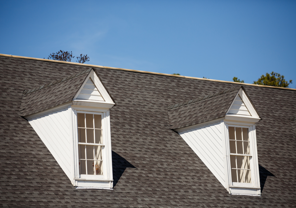 Two,White,Wood,Dormers,On,A,Grey,Shingle,Roof,Under